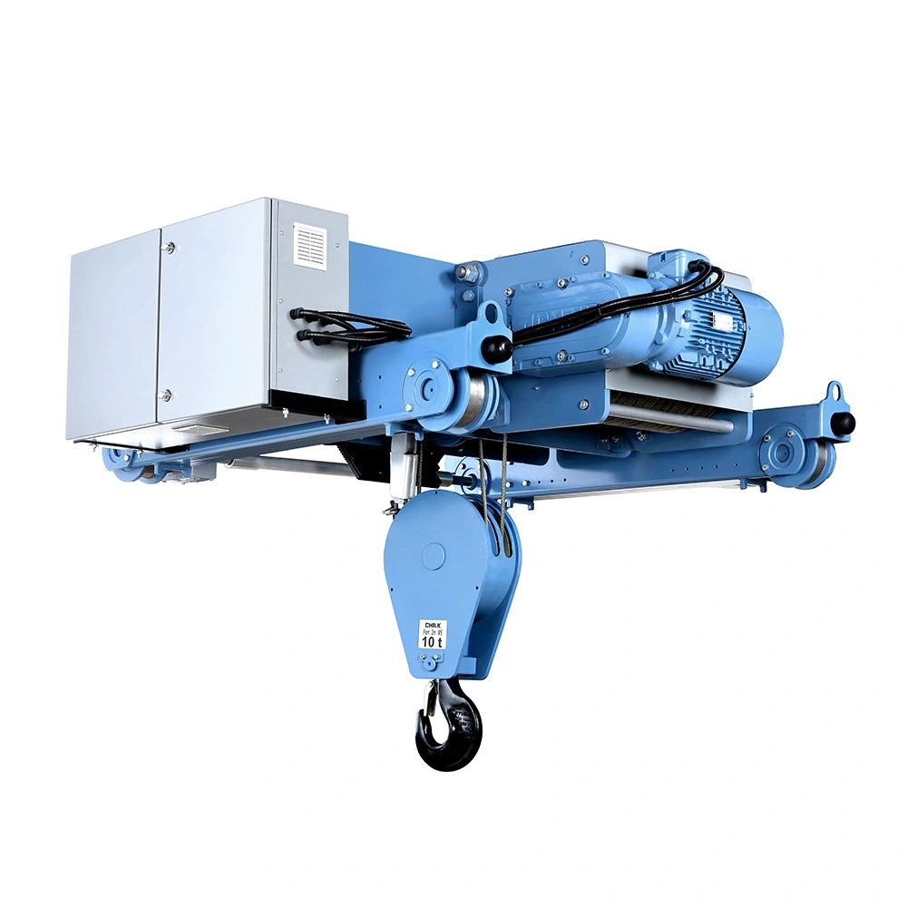 Rear-quarter view of a CMAK double-girder electric wire rope hoist trolley unit, highlighting the primary blue hoist motor, the robust gearbox assembly, and the complex conduit routing.
